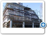 13. 
The house wrap is the secondary weather barrier. It is properly installed to work with the flashing components of the wall. The flashing and house wrap work together to protect the wall from moisture damage when properly installed. 